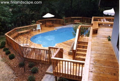 A hillside back yard including a swimming pool, multilevel decks and patios surrounded with new plantings. Multi Level Deck, Pool Deck Plans, Best Above Ground Pool, Swimming Pool Decks, Deck Designs Backyard, Above Ground Pool Decks, Backyard Pool Landscaping, Above Ground Swimming Pools, Decks Backyard