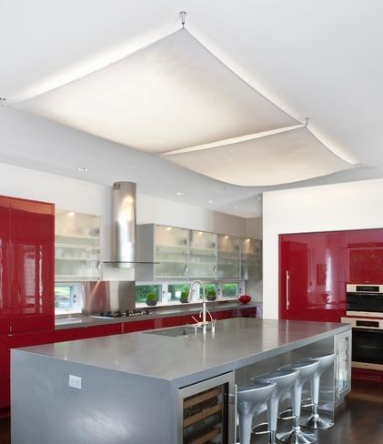 Clever ways to overcome an interior style burden:  overhead fluorescent lamps. Lighting Makeover, Fluorescent Light Covers, Owner Builder, Red Cabinets, Cherry Kitchen, Fluorescent Lamp, Transitional Kitchen, Red Kitchen, Fluorescent Light