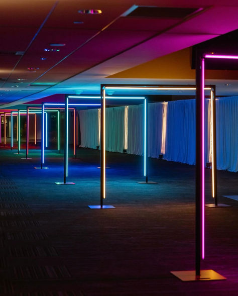 Multi-colored LED neon tunnels arch by LightSmiths Seattle Led Entrance, Event Tunnel Entrance, Led Tunnel Entrance, Tunnel Installation, Arch Entrance, Tunnel Entrance, Neon Tunnel, Led Tubes Installation, Led Tubes