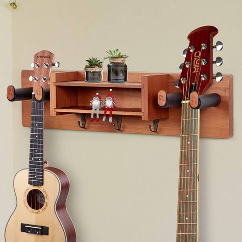 Ukulele Holder Wall Mount, Wall Mounted Guitar Ideas, Diy Guitar Mount, Wall Guitar Hanger, Diy Guitar Wall Hanger, Guitar Wall Hanger Ideas, Diy Ukulele Hanger, Guitar Holder Wall Diy, Guitar Wall Mount Ideas