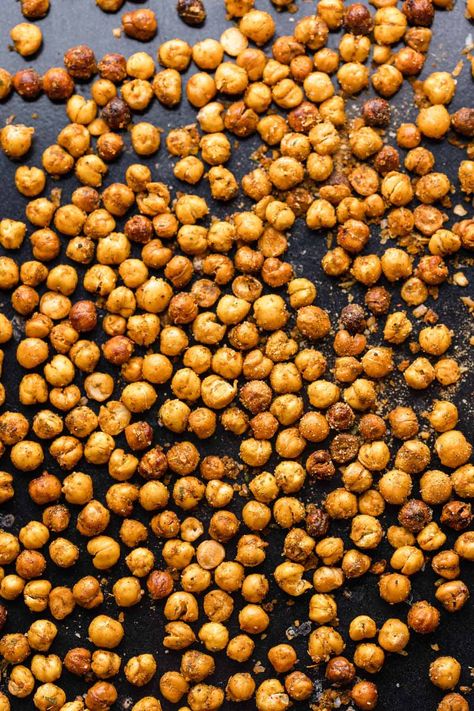 Learn how to make oven roasted chickpeas that are actually crispy and stay that way! All you need is a can of chickpeas, a tiny bit of oil and seasoning of your choice. | Gluten Free Vegan Roasted Chickpeas Oven, Roasted Chickpeas Recipe, Crispy Roasted Chickpeas, Oven Roasted Chickpeas, Chickpea Recipes Roasted, Chickpeas Recipe, Crispy Chickpeas, Allergy Free Recipes, Roasted Chickpeas