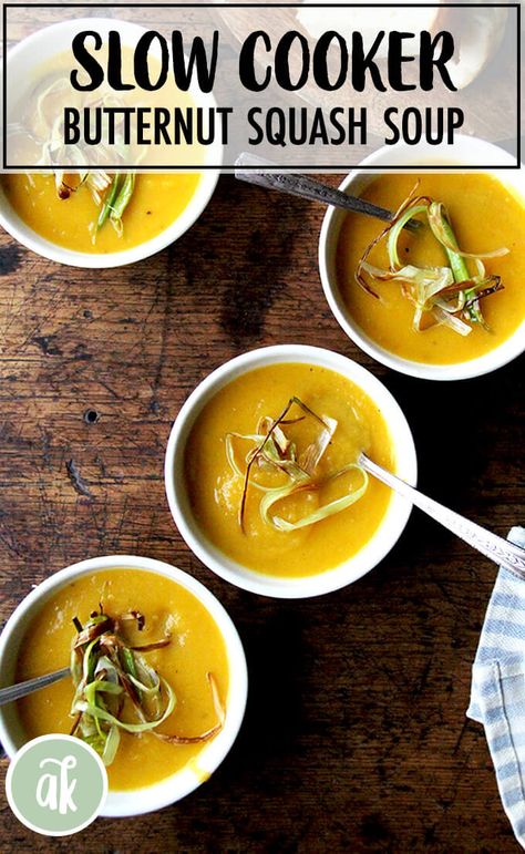 Slow-cooker Butternut Squash and Apple Soup — a fall favorite. The flavors of this butternut squash soup are so pure—the apple and carrots provide a touch of sweetness, the coconut milk a hint of richness. It couldn't be simpler: throw everything into a slow cooker with some water and let it cook for 4 to 8 hours. When it's time to serve, plunge in your immersion blender and purée with some coconut milk. That's it! #butternut #squash #soup #slowcooker #crockpot #apple Slow Cooker Butternut Squash, Apple Soup Recipes, Squash And Apple Soup, Squash Apple Soup, Butternut Squash Apple Soup, Crockpot Apple, Butternut Squash Apple, Winter Favorites, Appetizer Party