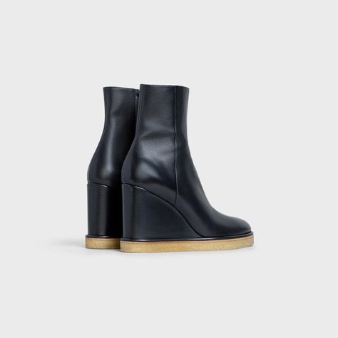 Manon Wedge Ankle Boot in Calfskin - Black - 335453190C.38NO | CELINE Celine Shoes, Handbags Leather, Wedge Ankle Boots, New Fragrances, Boutique Online, Womens Shoes Wedges, Leather Cover, Leather Goods, Online Purchase