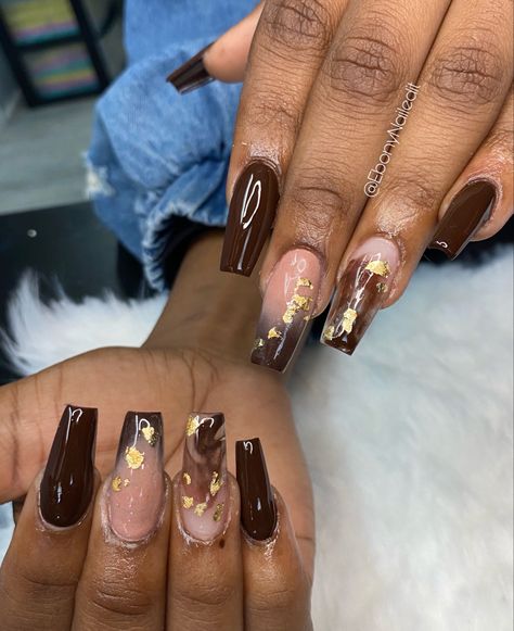 Brown and nude acrylic nails with gold foil flakes. Trendy Fall Nails Gold Foil, Brown Gold Flake Nails, Brown And Gold Foil Nails, Nail Design With Gold Flakes, Brown Nails With Gold Foil, Brown Nails With Gold Flakes, Brown And Gold Nails Short, Brown And Nude Acrylic Nails, Nails With Gold Foil Flakes