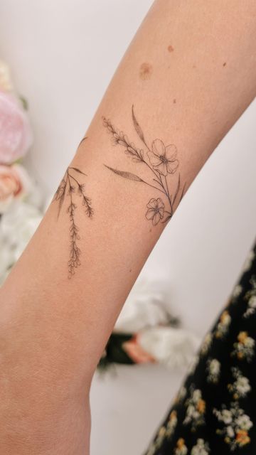 Small Floral Arm Tattoo, Floral Arm Cuff Tattoo, Flower Of Hope Tattoo, Morning Glory And Daffodil Tattoo, Multiple Tattoos On Arm, Floral Tattoo Wrap, Flower Forearm Wrap Tattoo, Flowers On Arm Tattoo, No Outline Flower Tattoo