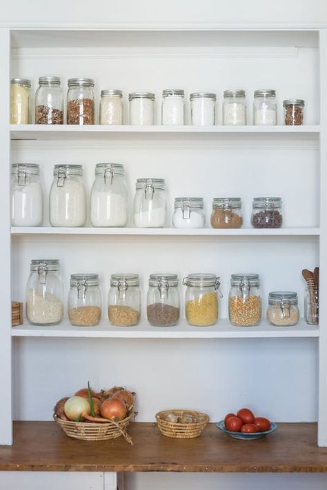 ​A pantry — of either the walk-in or the reach-in variety — can be tricky. Here's what to do to make it work for you. Ikea Jars, Pantry Organizing Ideas, Shallow Pantry, Diy Pantry Organization, Kitchen Cabinet Organization Ideas, Kitchen Cabinet Shelves, Pantry Organization Ideas, Pantry Shelves, Best Kitchen Cabinets