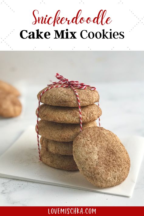 A snickerdoodle white cake mix cookie, coated with a mixture of brown ground cinnamon and white granulated sugar, leans against a stack of snickerdoodle cake mix cookies held together by red and white twine that is tied in a bow. Snickerdoodle Cake, Snickerdoodle Cookies Easy, Cake Mix Recipe, Daniel Fast Recipes, Snickerdoodle Cookies, Cookies Cake, Cookie Tray, Holiday Cookie, Cake Mix Recipes