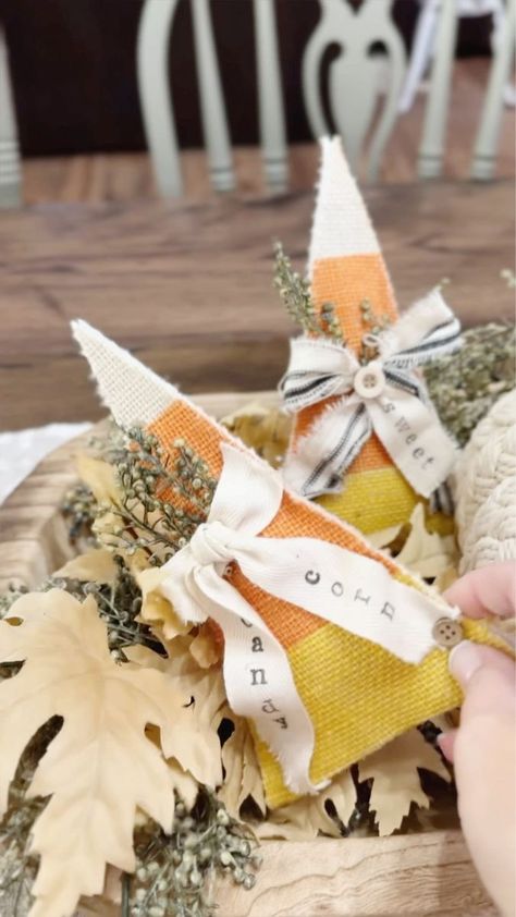 🤍🧡💛 Using a Dollar Tree Candy Corn Garland to Create the Cutest Bowl Fillers! | 🤍🧡💛 I used a Dollar Tree Candy Corn Garland to Create these Cute Burlap Bowl Fillers! 👀 Stay tuned to see how I used the other triangles left over from... | By Hammons Nest | Facebook Candy Corn Yarn Craft, Dollar Tree Candy Corn Garland, Burlap Candy Corn, Candy Corn Yarn Cone, Yarn Candy Corn, Candy Corn Bowl Fillers, Bowl Fillers Wreaths & Garlands, Candy Corn Crafts, Dollar Tree Fall