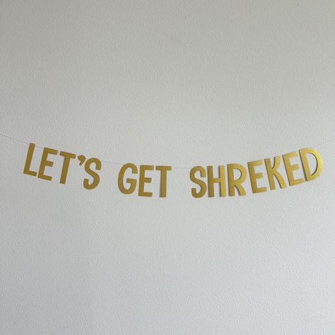 Ready to party like it’s Far Far Away? 🥳🟢 Our 'Let's Get Shreked' banner is here to bring the laughs and swamp vibes to your celebration! Perfect for fans of all things ogre-sized, it's the ultimate addition to birthdays, movie nights, or just getting Shrek-tacular with friends! 🎉💚 #LetsGetShreked #PartyTime #ShrekVibes #OgreSizedFun Shrek Party Ideas, Shrek Party Ideas Decoration, Party Ideas Decoration, Shrek Party, Themed Party Ideas, Custom Banner, Bachelorette Party Themes, Cotton String, Custom Banners