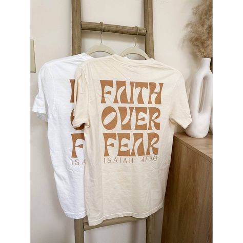 Faith Over Fear Graphic Tee | Screen Print Graphic Tshirt | Christian Apparel | Christian Tshirt | Graphic Christian Tee Faith Over Fear Graphic Tshirt Sizing: Unisex (See Size Guide In Photos For Measurements) Color: Ivory 100% Cotton Brand: Comfort Colors Design Bible T Shirt Design, Cute Christian Graphic Tees, Christian Tshirt Design Ideas Minimalist, Bible Verse Shirt Design, Church T Shirt Ideas Design, Church Merch Ideas, Trending T Shirt Designs, Christian Tshirt Design Ideas, Church T Shirt