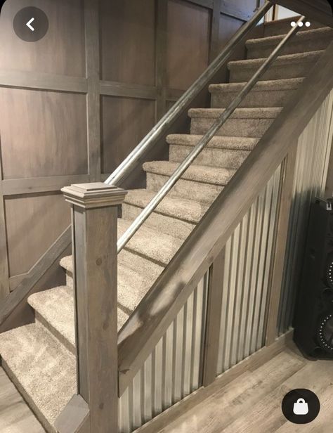 Garage Stairway Ideas, Metal Handrails For Stairs Farmhouse, Metal Waynes Coating Ideas, Basement Stairs Accent Wall, Accent Wall Down The Stairs, Basement Handrail Ideas, Diy Basement Stair Railing, Rustic Finished Basement, Basement Stairway Decorating