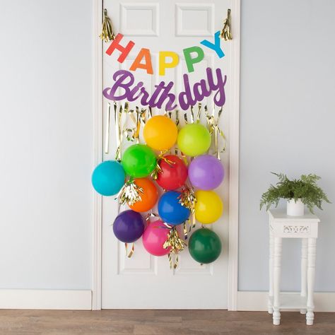 Surprise your birthday boy or girl with this sign on their front door or as part of their birthday decorations! Featuring a brightly colored "Happy birthday" hanging sign along with balloons and other hanging décor, this kit can help you throw a birthday bash for the memory books. (31 pcs. per unit) Includes one 1" x 36" clear plastic hanger, twelve 1/2" x 6 ft. 6" foil stripes, two foil cardstock garlands, four 6" gold foil tassels, three 11" gold latex balloons and nine 11" multi-colored latex balloons. Bday Door Decoration, Door Decoration For Birthday, Birthday Decoration In Home, Office Decor Birthday, Teacher Birthday Door Decorations Ideas, Birthday Door Decor, Nine Birthday Ideas, Birthday Porch Decorations, Happy Birthday Morning Surprise