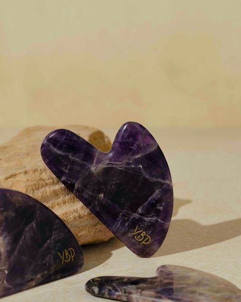 Gua Sha is our not-so-secret answer for Brighter Complexion, more even + Lifted Skin ✨️ It's our favorite way to Relieve Facial Tension from Everyday Stress 😇 Our Gua Sha stones are crafted from 100% Real Authentic crystals without any synthetic colors or fillers.🩵 Available in 4 distinct shapes and sizes, we offer 2 types of crystals: ⭐️YBP Rose Quartz Gua Sha for Acne, Inflammation, Migraines, Dark Circles and Allergies. ⭐️YBP Amethyst Gua Sha for Dull, Dry and Tired Looking Skin. Each... Rose Quartz Gua Sha, Types Of Crystals, Gua Sha, Migraine, Dark Circles, Allergies, Rose Quartz, Circles, Facial