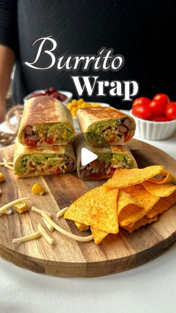 Megha Mahindroo | Recipe Video Creator on Instagram: "Burrito Wrap 🌯 Save this Recipe ✅✨ And make up your mind for Mexican food ❤️ Here is what all you need: For the Guacamole : 1 well riped Avocado Green chilies Salt and pepper Lemon juice For the Salsa: Chopped onion Chopped tomato Lemon juice Salt For the Rice: Chopped Garlic Boiled Corn Boiled kidney beans Cooked rice Tomato ketchup Salt and paprika Coriander Tortilla wrap Oil to fry (Burrito wrap, Mexican food, avocado salsa, guacamole, mexican rice, burrito rice, burrito wrap, wrap recipe, easy wrap recipe, bean burrito, vegetable wrap, burrito) #recipe #burrito #burritowrap #burritobowl #burritos #wrap #mexicanfood #easyrecipes #healthyrecipes #explorepage #avocado #guacamole #mexicansalsa #salsa #tortilla #tortil Burritos Videos, Burrito Wrap Recipe, Wraps Recipes Videos, Home Made Wraps, Healthy Burrito Wrap, Burrito Wrap Recipe Tortillas, Mexican Wrap, How To Make A Burrito Wrap, Mexican Wraps Vegetarian