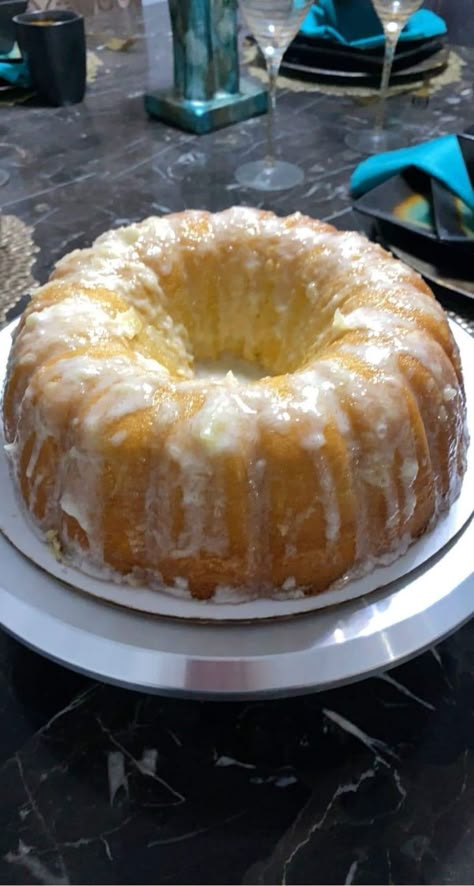 If you're a fan of pound cake this Pineapple Pound Cake with Cream Cheese Glaze will knock your socks off. The chunky cream cheese glaze adds the crowning touch to this phenomenal made-from-scratch pound cake. Here Pineapple Cream Cheese Pound Cake, Pineapple Pound Cake, Pineapple Cream Cheese, Swans Down Cake Flour, Cream Cheese Bundt Cake, Cream Cheese Pound Cake Recipe, Cheese Pound Cake, Cream Cheese Pound Cake, Cream Cheese Glaze