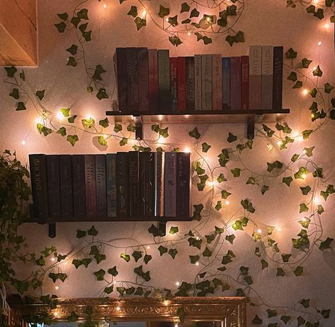 Fairy Lights Shelves, Fairy Core Bookshelf, Fairycore Bookshelf, Bookshelf Design Aesthetic, Bedroom Inspo With Bookshelf, Forest Green Library Room, Room Decor Ideas Bookshelf, Vines On Bookshelf, Green Book Room