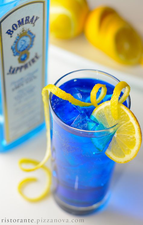 LIMONATA AZZURO! Bombay sapphire gin, blue curacao, fresh-squeezed lemon juice & simple syrup, topped with a spash of soda. Can you say refreshing? Bombay Sapphire Gin, I Need A Drink, Bombay Sapphire, Squeezed Lemon, Product Shoot, Blue Curacao, How To Squeeze Lemons, Soda Can, Simple Syrup