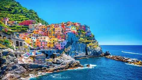 25 Stunning Photos of the Most Colorful Places on Earth | The Discoverer Fly Geyser, Landscape Wall Painting, Holland America Line, Electric Forest, Willemstad, Colorful Places, Cinque Terre Italy, Hidden Beach, Places In Europe