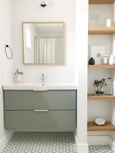 The guest bathroom utilizes a simple Ikea vanity custom painted to the perfect shade of green and features leather hardware from the Australian company Made Measure. Drømme Bad, Design Interior Baie, Guest Bathroom Design, Ikea Vanity, Green Vanity, Ikea Bathroom, Decor Ikea, Decor Baie, Simple Bathroom