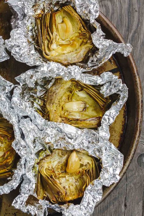 Easy Summer Bbq Ideas, Oven Roasted Artichoke, Artichoke Appetizer, Roasted Artichokes, Artichoke Recipe, Garlic Vinaigrette, Appetizer Party, Roasted Artichoke, The Mediterranean Dish