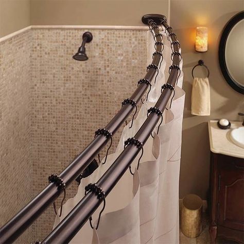 How to Refresh Your Shower Without Breaking the Bank | Double curved shower rods add several inches of space to your shower and keep your liner and decorative curtain separate. #bathroomupdate #homeimprovement #bathroomremodel #bathroomrenovation Double Shower Curtain Rod, Curved Shower Rod, Makeover Kamar Mandi, Double Shower Curtain, Primitive Bathrooms, Small Bathtub, Shower Curtain Rod, Double Shower, Shower Rod