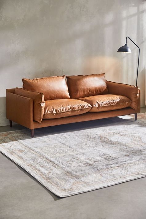 Dreaming of NYC? 🗽 Go for a loft look with industrial styling ✨ Shop our Evie Home and New & Exclusive collections now. Tan Sofa Living Room, Tan Leather Couch, Sofa Colour, Tan Sofa, Genuine Leather Sofa, Cafe Aesthetic, Lounge Suites, Leather Pouf, Leather Couch