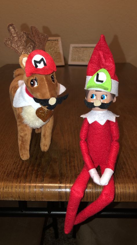 Mario & Luigi!!! Elf on the Shelf & his Reindeer pet! Elf On The Shelf Mario Ideas, Elf On Shelf With Pet Ideas, Elf With Pet Ideas, Elf On The Shelf December Birthday, Elf On The Shelf Friends, Reindeer On The Shelf Ideas, Elf Pets Reindeer Ideas, Elf On Shelf Reindeer Ideas, Elf And Elf Pet Ideas