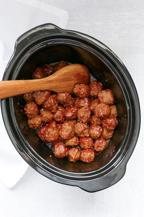 Sweet & spicy slow cooker meatballs are perfect for gameday! Easy to put together and make for a crowd-pleasing appetizer. Turkey Meatball Appetizer Crockpot, Meatballs In Crockpot, Meatballs In The Crockpot, Frozen Meatballs Crockpot, Sweet And Spicy Meatballs, Turkey Meatballs Crockpot, Sweet Spicy Sauce, Homemade Meatballs Recipe, Crockpot Meatballs