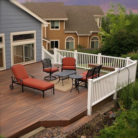 Take the blue and orange design trend outdoors. This color combination really works in this backyard retreat. The great looking, low-maintenance composite deck and white railing are from Fiberon. Find out where you can get a great space like this. Go to our 'where to buy' Web page. Deck Color Combinations, Decking Colours Ideas, Blue Siding House, Blue And Orange Design, White Railing, Decking Railing, Deck Stain Colors, Deck Colors, Composite Deck