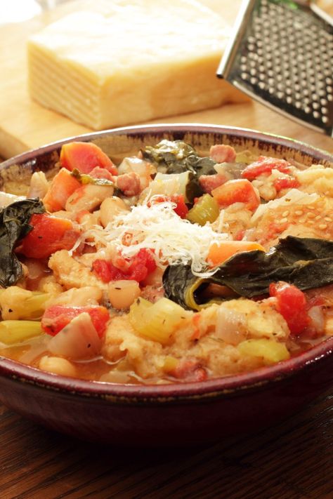 Ina Garten Ribollita is made with white beans, pancetta, onions, carrots, celery, garlic, tomatoes, cabbage (optional), kale, basil, chicken stock, and sourdough bread. This easy Ribollita soup recipe makes a delicious and healthy dinner in about 1 hour and 45 minutes and serves up to 6 people. Ribollita Soup Ina Garten, Ribollita Soup, How To Soak Beans, Ina Garten Recipes, Carrots Celery, Basil Chicken, Stale Bread, Barefoot Contessa, Chopped Carrots