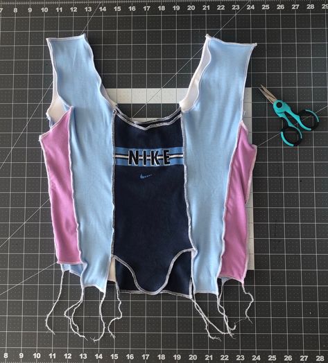 JJVintage Is the Thrifty Label Making Patchwork Tanks Out of Nike Gear | Vogue Reworked Clothes, Nike Gear, Upcycle Clothes Diy, Diy Vetement, Website Launch, Diy Fashion Clothing, Diy Sewing Clothes, How To Make Clothes, Refashion Clothes