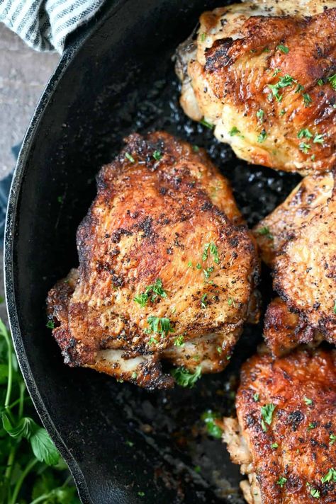 Close up photo of a chicken thigh in a cast iron skillet. Chicken Cast Iron Skillet, Cast Iron Chicken Recipes, Skillet Chicken Thighs, Cast Iron Chicken, Iron Skillet Recipes, Roasted Chicken Thighs, Oven Fried Chicken, Cast Iron Skillet Recipes, Cast Iron Recipes