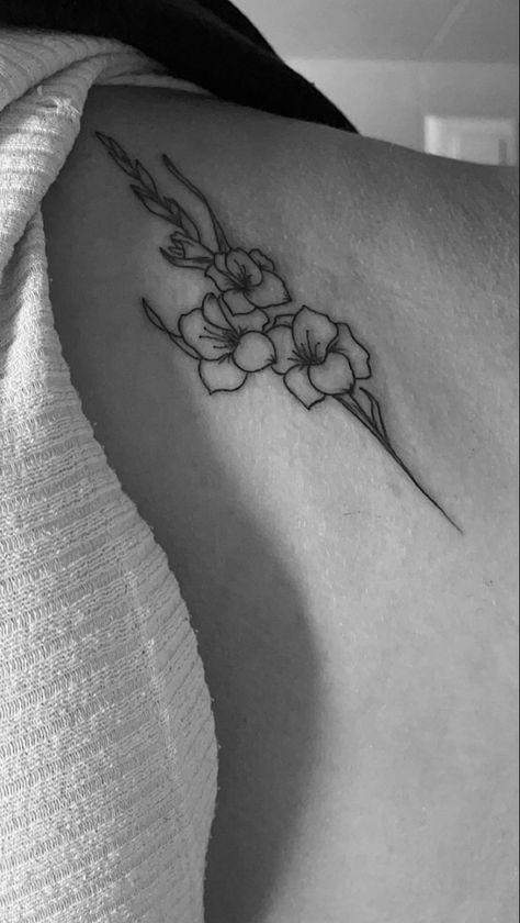 🌸 Elegant Floral Tattoo Inspiration 🌸
Absolutely loving this delicate fine line Gladiolus tattoo on the ribs! Symbolizing strength and grace, the Gladiolus flower is perfect for those who want a meaningful yet understated design. The placement on the ribs adds an extra touch of elegance and sophistication. If you’re into minimal floral tattoos, follow for more ink ideas and inspiration! ✨

#FloralTattoo #GladiolusTattoo #FineLineTattoo #MinimalistTattoo #RibTattoo #TattooIdeas #BodyArt #InkInspiration Gladiolus Flower Tattoo Fine Line, Gladiolus Rib Tattoo, Tiny Gladiolus Tattoo, Fine Line Gladiolus, Gladiolus Line Art, Gladiolus Tattoo, Gladiolus Flower, Rib Tattoo, Fine Line Tattoos