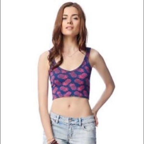 PINEAPPLE CROP TOP NWT LARGE AEROPOSTALE Cute pineapple top! Purchased but never worn or tried on. Retails at $19.50 + tax. Flat measurements: armpit to armpit 15", top strap to hem 15.5" mid back to hem 8", mid front to hem 7". Navy blue with pink/fuchsia pineapples. 94% cotton, 6% spandex. Made in Cambodia. Aeropostale Tops Crop Tops Pineapple Graphic, White Lace Tank Top, Cute Pineapple, Layering Tank Tops, Black Cropped Tank, Style Tank Top, Crop Tank Top, Lace Tank Top, Cropped Tank Top