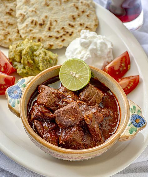 Pork Chile Colorado: If there is such a thing as Mexican soul food, this is it – carne con chile colorado, literally “meat with red-colored chile sauce.” For this year’s Cinco de Mayo celebration, honor the true spirit of Mexican cuisine by making this flavorful and well-loved dish. Chile Colorado Recipe, Chile Colorado, Colorado Food, Pork Chili, Chile Sauce, Mexico Food, Mexican Cooking, Hispanic Food, Pork Dishes