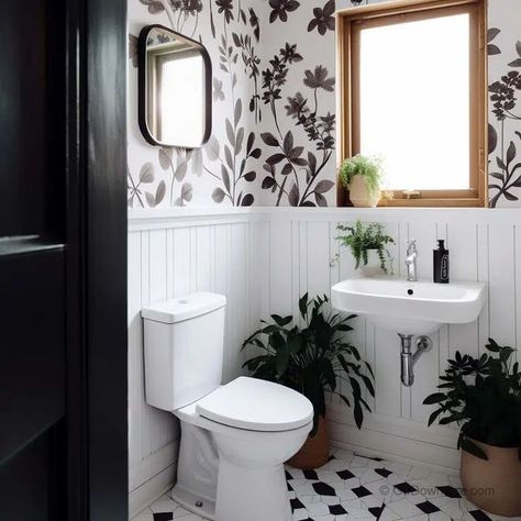 The black and white floral wallpaper introduces a timeless charm to the bathroom, offering a perfect balance between sophistication and natural beauty. White Tile Bathroom With Wallpaper, Black And White Bathrooms With Wallpaper, Small Bathroom Beadboard And Wallpaper, Black And White Wallpaper For Bathroom, White Board And Batten Bathroom, Small Bathroom Beadboard, Black And White Wallpaper Bathroom, White Bathroom With Wallpaper, Bathrooms With Wallpaper