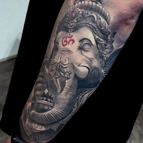 101 Amazing Ganesha Tattoo Designs You Need To See! | Outsons | Men's Fashion Tips And Style Guide For 2020 Pliska Rosette Tattoo, Ganesha Tattoo Forearm, Ganesha Tattoo Design For Men, Elephant God Tattoo, Ganesh Tattoo Design, Ganesha Tattoo Sleeve, Lord Ganesha Tattoo, Ganesha Tattoo Design, Mj Tattoo