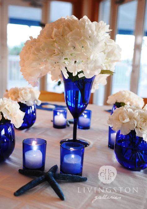 Hmm ...  cobalt glass? Cobalt Blue Wedding, Glass For Wedding, Royal Blue Wedding Decorations, Wedding Centerpieces Ideas, Cobalt Blue Weddings, Blue Wedding Decor, 65th Wedding Anniversary, Cobalt Wedding, Blue Wedding Centerpieces