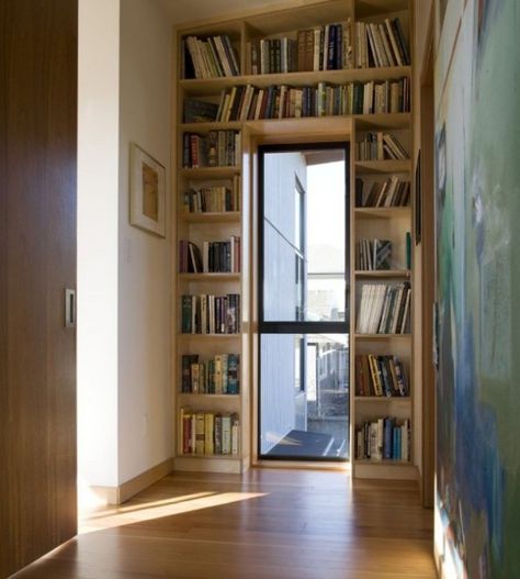 Library with a view Door Frame Library, Cornered Bookshelf, Built In Bookcase Around Door, Bookshelf Wall With Door, Bookshelf Over Doorway, Bookshelf Doorway, Simple Contemporary House, Homemade Bookshelves, Diy Bookshelf Plans