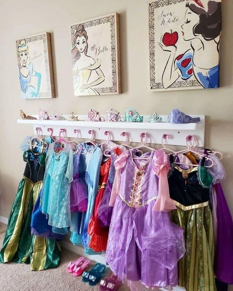 Princess Dress Storage Ideas, Princess Dress Hooks, Dress Up Tiara Storage, Hang Princess Dresses, Playroom Dressup Corner, Disney Princess Playroom, Princess Dress Organization, Girl Dress Up Station, Princess Dress Storage