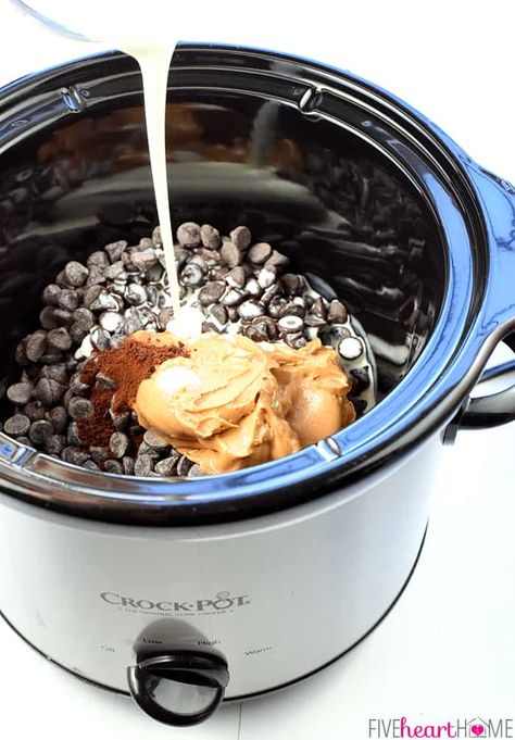 Slow Cooker Chocolate Peanut Butter Fondue ~ a decadent, glossy, chocolate dessert recipe kissed with peanut butter, the perfect crock pot dip for your favorite fruit and confections on Valentine's Day or any day! | FiveHeartHome.com Slow Cooker Fondue Chocolate, Chocolate Dip In Crockpot, Fondue Recipes Crockpot, Diy Fondue Pot Ideas, Crock Pot Chocolate Fondue, Dessert Fondue Board, Fondue In A Crock Pot, Crockpot Fondue Chocolate, Crockpot Cheese Fondue