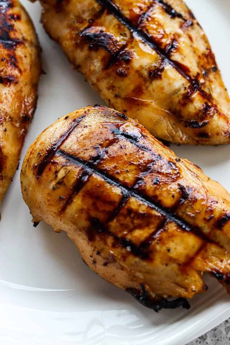 Spicy honey chicken marinade is a fantastic grilled chicken recipe. This chicken makes a great healthy dinner recipe and it also is perfect for cookouts, barbecues, memorial day, the 4th of july, and weeknight dinners! Make this chicken marinade recipe today! Sweet Chicken Marinade, Spicy Sweet Chicken, Honey Marinade For Chicken, Spicy Chicken Marinades, Spicy Honey Chicken, Sweet And Spicy Chicken, Chicken Marinade Recipes, Sweet Chicken, Easy Grilling