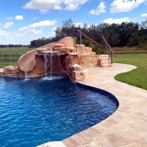 What’s more fun than adding a grotto waterfall to your swimming pool? Adding a slide too! 

In these photos, you can see our Component Grotto kit. Faux rock panels surround the slide, and steppers in the back provide access to the slide.

Note: RicoRock does NOT sell water slides. 

Credit: South Texas Pools Pool Ideas With Slide, Backyard Pool With Slide, Fiberglass Pool Ideas, Grotto Waterfall, Faux Rock Panels, Pool Grotto, Fiberglass Pool Cost, Grotto Pool, Latham Pool