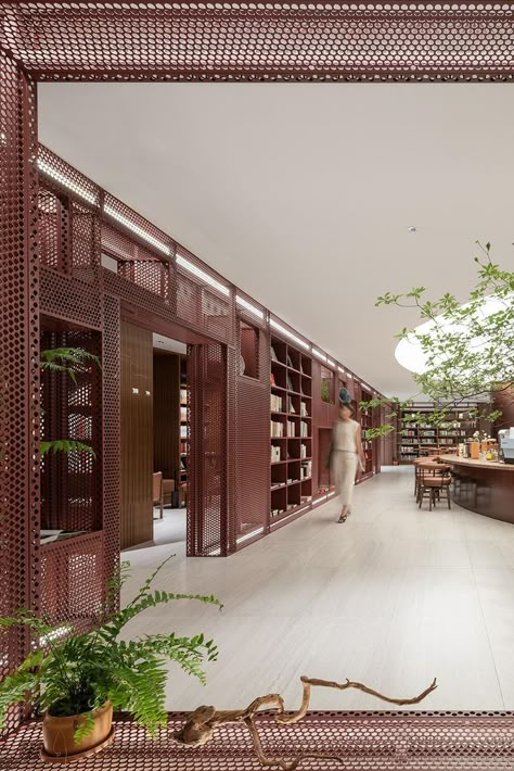 The name of the bookstore and the concept came from the creative happenstance of Mr. Lin Feng of CIFI Group. The bookstore's philosophy that takes books as mountains, poems as books, flowers as decorations, tea as fragrance, and wine as companion, forms the spirit of the entire bookstore. #architonic #design #architecture #architecturedesign #interiordesign #dailyarchitecture #architecturephotography #architecturelovers #projectdesign #interiorinspiration #store #bookstore #designlover #China Book Cafe Design Architecture, Creative Library Design, Book Concept Architecture, Library Of Things, Bookstore Design Interior, Book Store Design Interior, Library Concept Architecture, Book Cafe Interior Design, Office Library Design