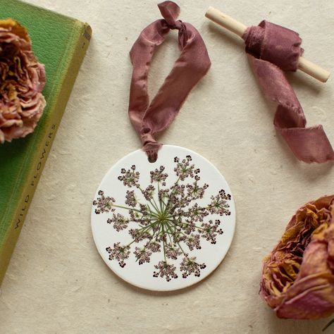 Launching 14th October 🤍 I’m busy working on my new Collection of pressed flower decorations - it’s going to be difficult to part with these, there’s a strong urge to keep them all! #pressedflowers #madewithlove #giftideas #handmade #uksmallbusiness Pretty Flower Art, Queen Anne's Lace Flowers, Hand Dyed Silk Ribbon, Habotai Silk, Queen Anne's Lace, Floral Craft, Queen Annes Lace, Clay Ornaments, Flower Ornaments