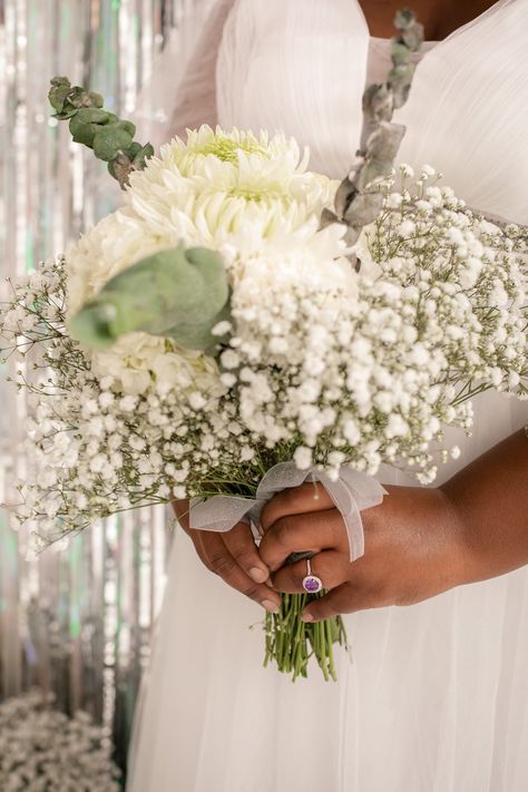 This is a wedding bouquet made of mum's, eucalyptus and baby's breath. Simple Bouquet, Mums Wedding, Wedding Flower Trends, White Mums, Eucalyptus Bouquet, White Chrysanthemum, White Wedding Bouquets, Baby S Breath, Wedding 2025