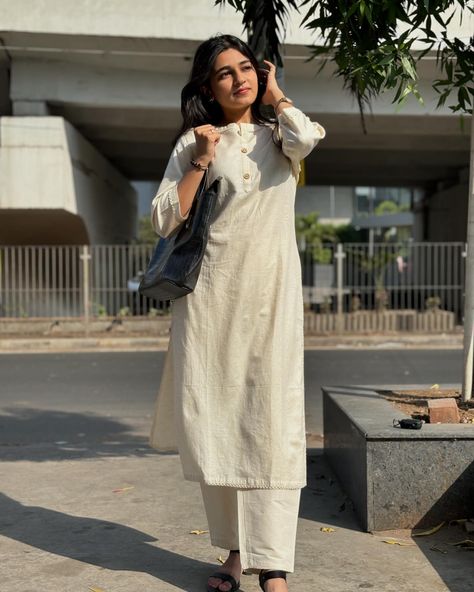 Saadagi Straight Kurti 🌼 Versatile for both corporate and casual fits, it’s the perfect addition to your wardrobe. Complete the look with a cotton trouser for a classic style. The model is wearing the size S. #aprilone #khadicotton #khadi #khadiindia #cottonkurti #corporatelook #officelook #officelooks #indiankurtis #womensfashion #casualoutfit #sustainablefashion #sustainableclothing #sustainablymade #explorepage Khadi Cotton Kurti, Straight Kurti, Designer Dresses Casual, The Model, Sustainable Clothing, Casual Fits, Sustainable Fashion, Pure Cotton, Designer Dresses