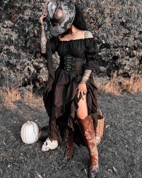 Spooky cottage boots ✨ National day of the cowboy boots but make it spooky with @justinboots_ 🖤 National Day of the Cowboy Boot celebrates the craftsmanship and artistry behind these iconic boots. From classic leather to modern exotic skins, Justin Boots has been a leader in cowboy boot innovation for 145 years, setting the Standard of the West Since 1879.🎃 #cowgirlstyle #cowgirlboots #cowgirlfashion #nationaldayofthecowboyboot Spooky Cottage, Textured Hat, The Cowboy, Justin Boots, Black Corset, Cowboy Boot, National Day, Cowgirl Style, Classic Leather