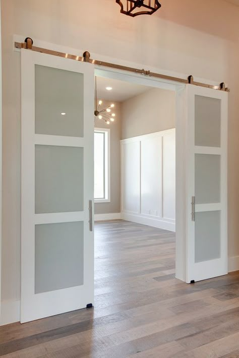 3-panel frosted glass barn doors to study  #dreamhome #interior #interiors #interiordesign #dfw #dallas #greenhome #customhome #architecture #homedesign #design #home #barndoor #barndoors #door #doors #study Sliding Barn Doors With Glass, Sliding Doors With Glass Panels, Sliding Door Hallway, Sliding Door To Laundry Room, Frosted Office Doors For Home, Studio Sliding Doors, Study Room Door Ideas, Modern Double Sliding Doors Interior, Double Doors Sliding