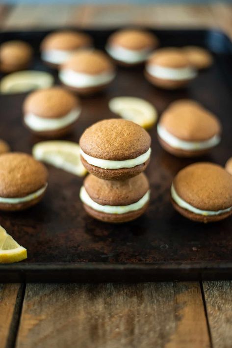 These Lemon Ginger Cream Sandwich Cookies are a wonderful fall treat. With warm flavors of ginger, cinnamon and nutmeg, fresh lemon in the cookie and the filling brings all the flavors together. #lemongingercookies #sandwichcookies #gingerbread Lemon Cream Cheese Filling, Cream Sandwich Cookies, Great British Food, Lemon Cream Cheese, Dessert Bites, Kinds Of Cookies, Lemon Ginger, Sweet Treats Recipes, Cream Sandwich